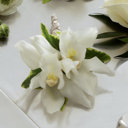 White Mini Cymbidium Boutonniere –  Springerville Flower Shop, Springerville AZ